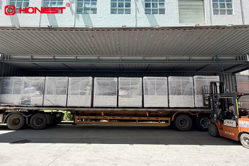 Loading equipment onto the vehicle.jpg Loading equipment onto the vehicle.jpg
